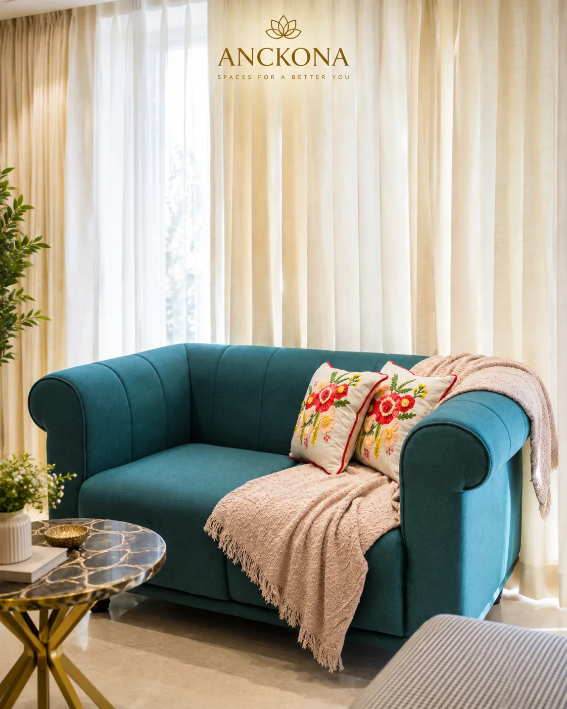Living room seating beside softly lit curtains